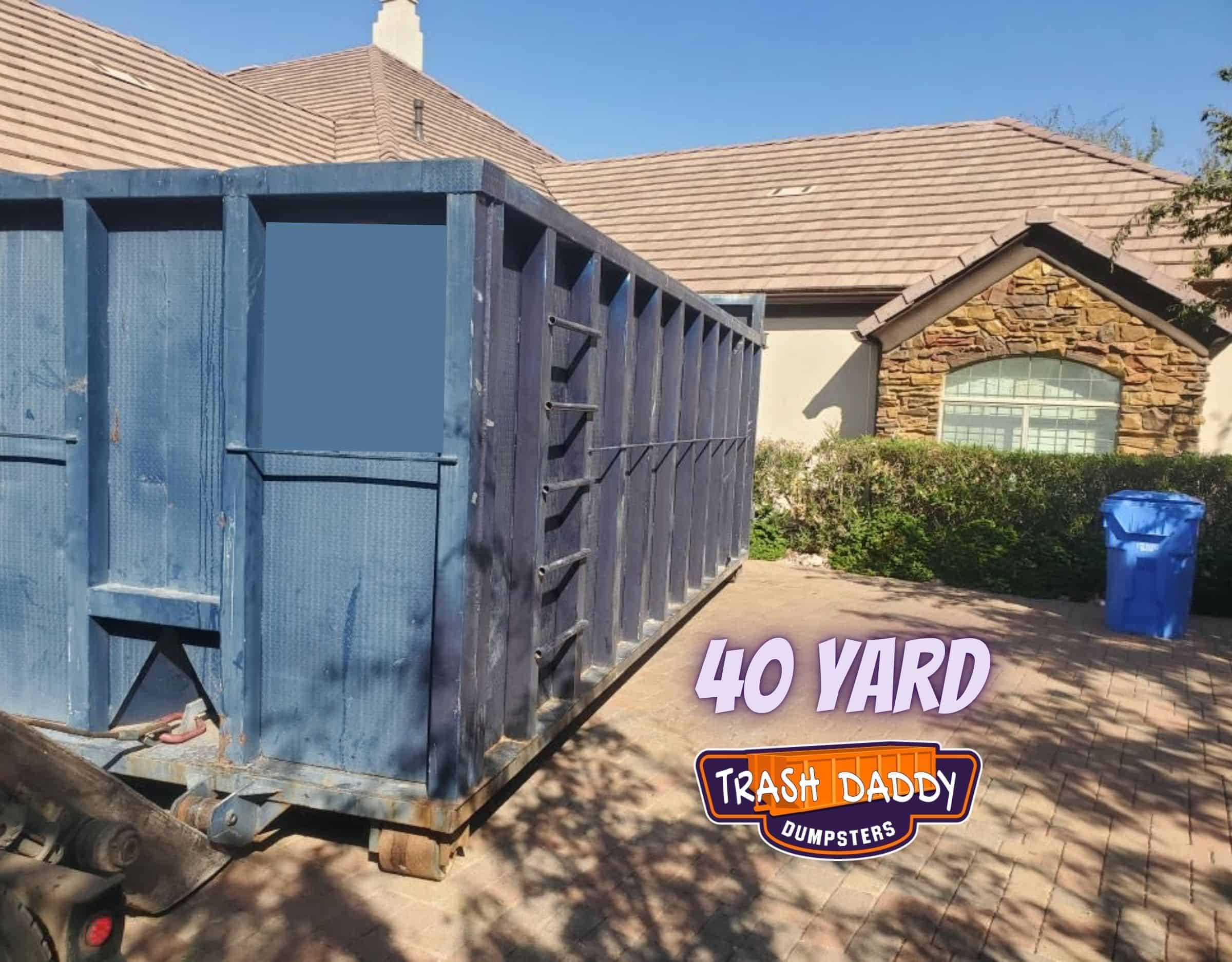 40 yard dumpster in a driveway