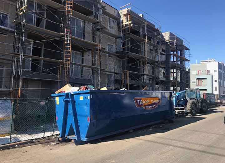 30 yard construction dumpster rental in Denver at apartment build