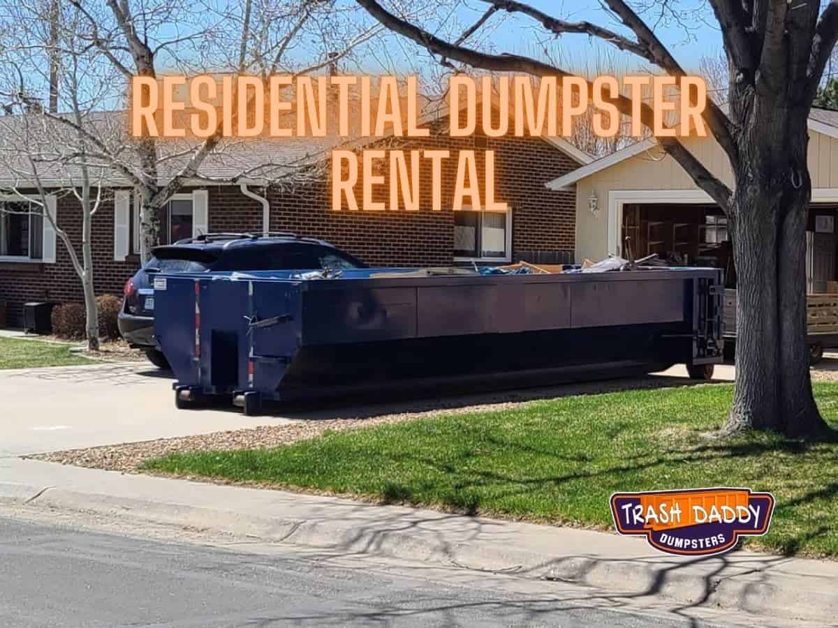 dumpster in residential driveway