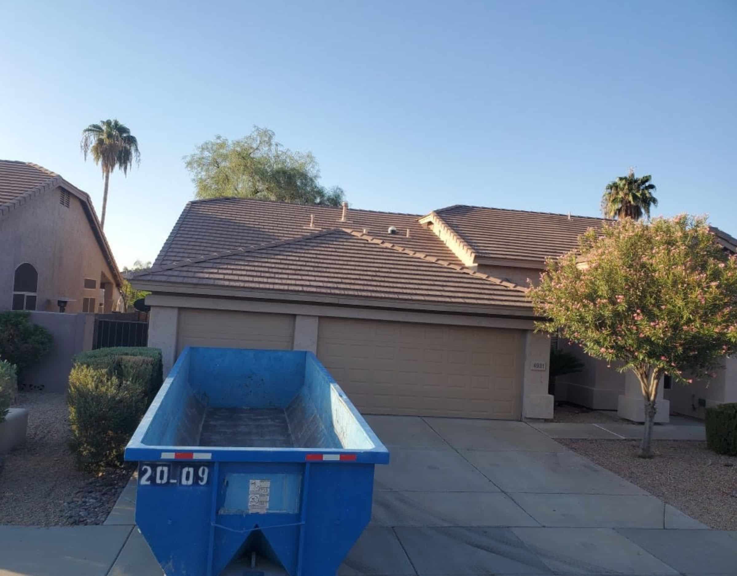 20 yard dumpster in a driveway