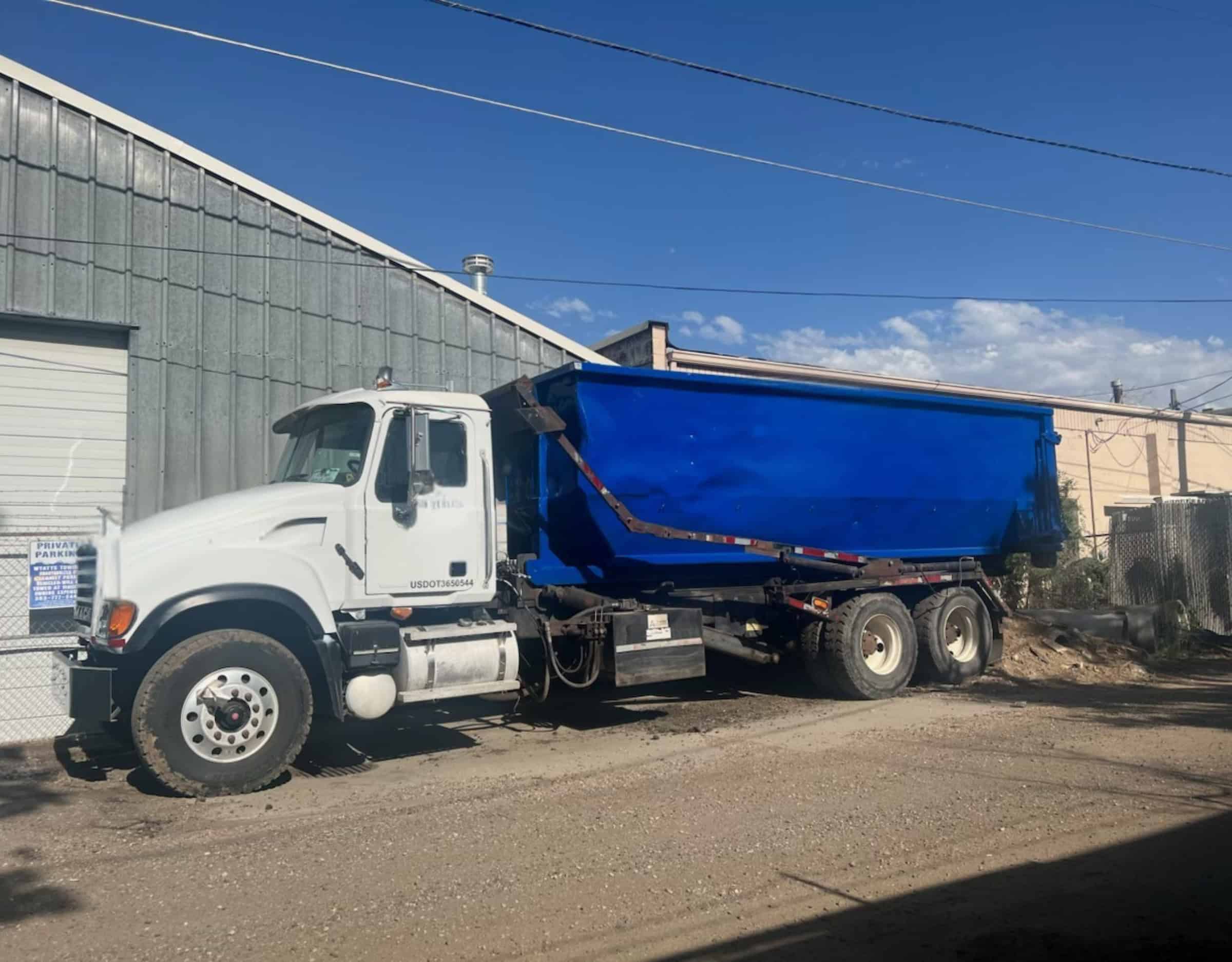 30 yard roll off dumpster on a truck