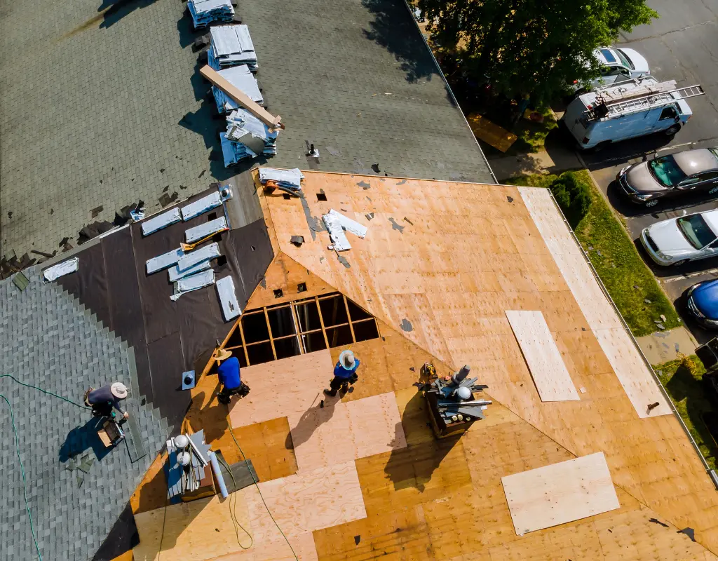 Roofing project in progress with a dumpster that is an appropriate size