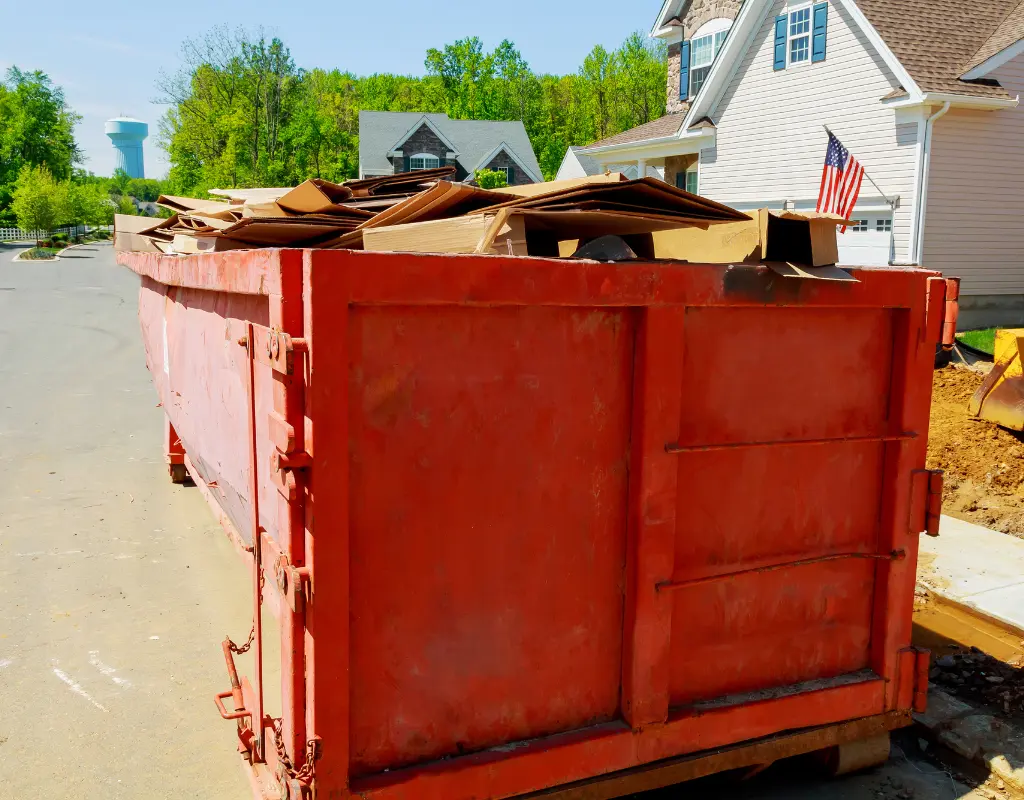 An overfilled dumpster that will incur additional charges